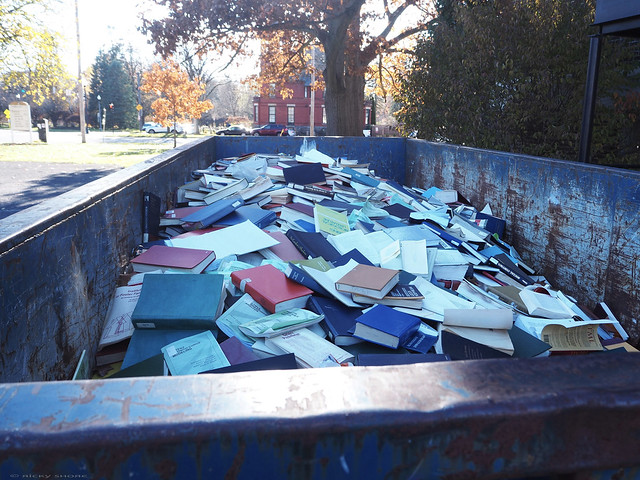 dumpster full of books - Albany, NY