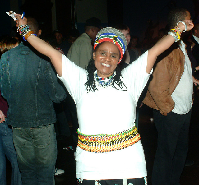 DSCF0498w Republic of South Africa 8th Freedom Day Celebration April 2002 by the SAHC South African High Commission UK at Camden Town Hall Kings Cross London with Nomsa in White Cultural Costume Zulu Beads and Hat
