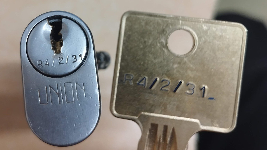 An image of a key and a lock where the codes written on them are matching 