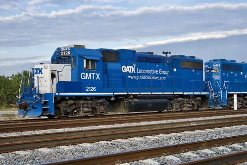 12-18-22, GMTX GP38-2 2126 These two units are being used by Brightline in the construction of their passenger line between Miami and Orlando. The 2126 was built in 9/76 as Rock Island 4316, to Missouri Pacific as 2254, then to Union Pacific as 2254, renumbered to 754.