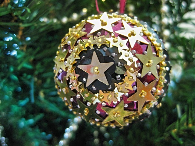 A Hand Beaded Burgundy and Black Gold Star Christmas Bauble