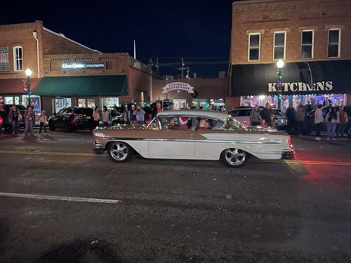 Classic Mineola, Texas is one of my favorite towns. It has a population of less than 5,000 residents, yet they are able to put together some spectacles, like the annual Christmas parade down the main street. Here, what appears to be a classic 1958 Chevy coupe rolls slowly along the parade route, impressing all.