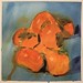 Persimmons on blue cloth