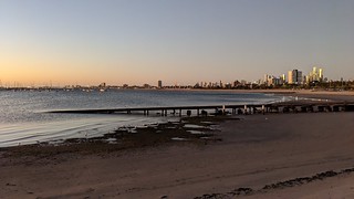 Summer sunset looking towards Melbourne city at St Kilda Beach, Melbourne