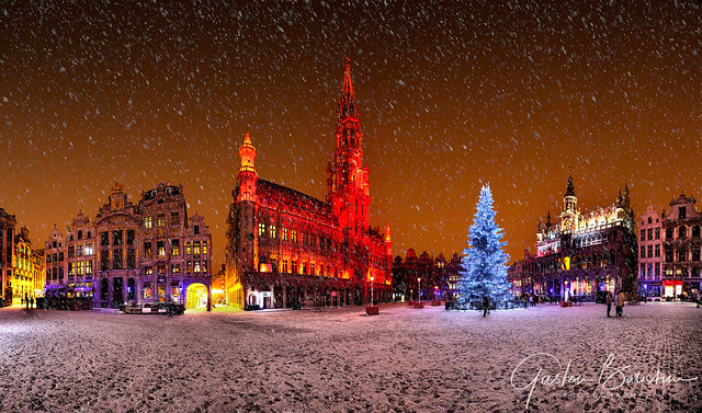Snowing over the great market Brussels, Belgium