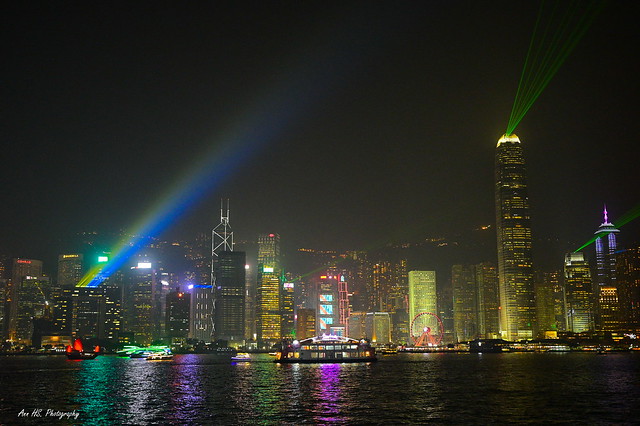 Hong Kong & light up in Victoria Harbour.