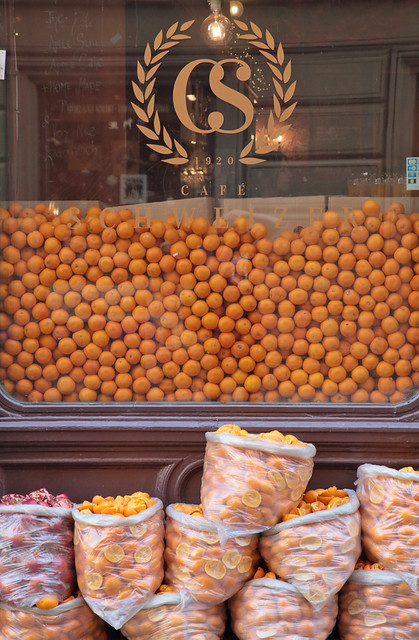 Oranges Behind Glass