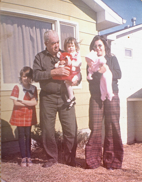 Deborah Garmon holding Lily Garmon, Grandpa Lawrence Timm holding Sheila Garmon, and Theresa Garmon 1974