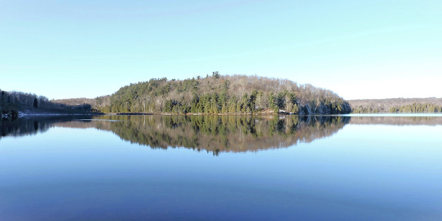 Drumlin, shoreline reflections in Meech Lake