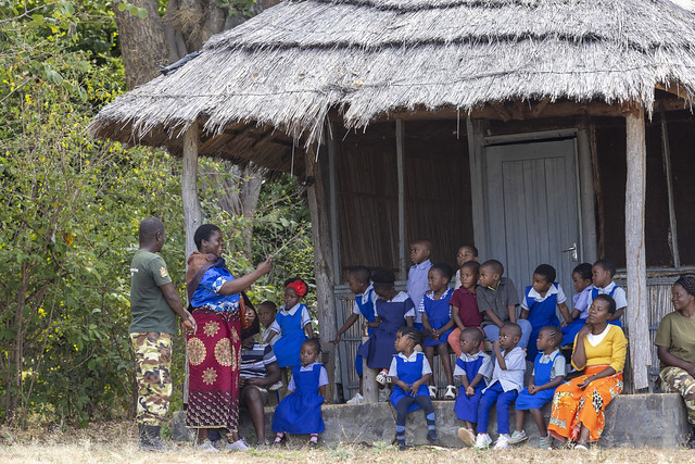 School kids and Game scout, Lake Kazuni, Vwaza NP, Malawi. photo ED