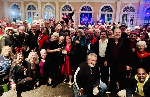 Volunteers, show hosts, staff, and more at the WWOZ Family Holiday Party, Dec 13, 2023 at the Pavilion of the Two Sisters in City Park