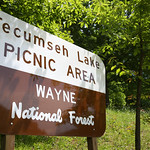 Tecumseh Lake Picnic Area Tecumseh Lake Picnic Area lies outside of the Village of Shawnee. It contains a small lake, a picnic area, trails, and more.

Forest Service photo by Gary Chancey.