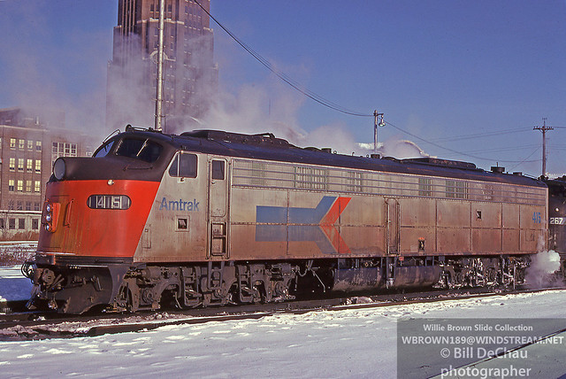 Amtrak E9A 415 {built 12/62 as Union Pacific 910} is at Buffalo, NY on 12/24/75.