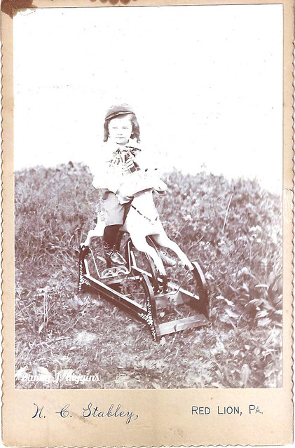 A Boy On A Rocking Horse Toy.  2023-12-20_174901