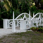 Victorian Bridge The Koreshan Unity Settlement, near Naples Florida is an abandoned 19th century religious community. 

The Koreshan Unity was a self-sufficient communal utopia formed by Cyrus Teed, a distant relative of Joseph Smith, founder of the Latter Day Saint movement. The Koreshans followed Teed&#039;s beliefs, called Koreshanity, and he was regarded by his adherents as &amp;quot;the new Messiah now in the World&amp;quot;. After moving from New York to Illinois, the group eventually settled in Estero, Florida. 

They grew fruit &amp;amp; veg, raised cattle, cut lumber and generated electricity on the site, which at it&#039;s height housed more than 200 people. Unfortunately their adherence to a life of celibacy automatically doomed them to extinction. The last person to officially admit membership to the Koreshans died in 1982. In 1962 the remaining Koreshans handed over their land and buildings to the State of Florida for preservation as a State Park.