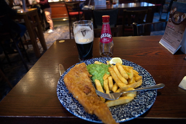 DSC_3975 The Masque Haunt Old Street Shoreditch London JD Wetherspoon Pub Cod Fish and Chips with Mushy Green Peas Sarsons Malt Vinegar and a pint of Guinness Stout Beer £9.85