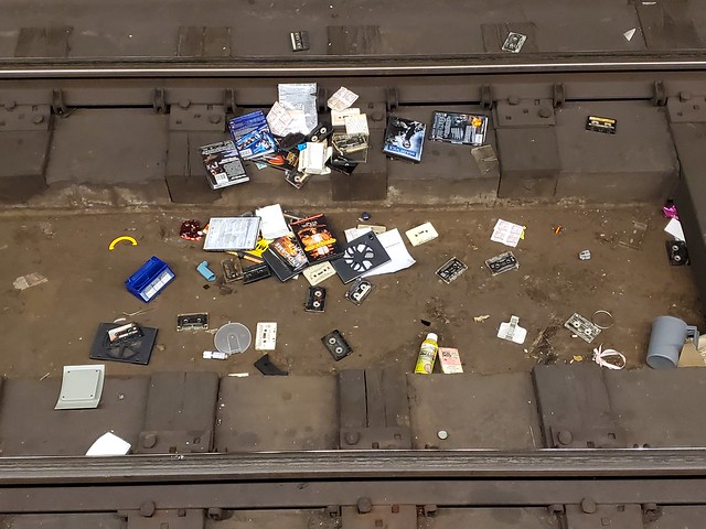 Scattered on the 1 train tracks.