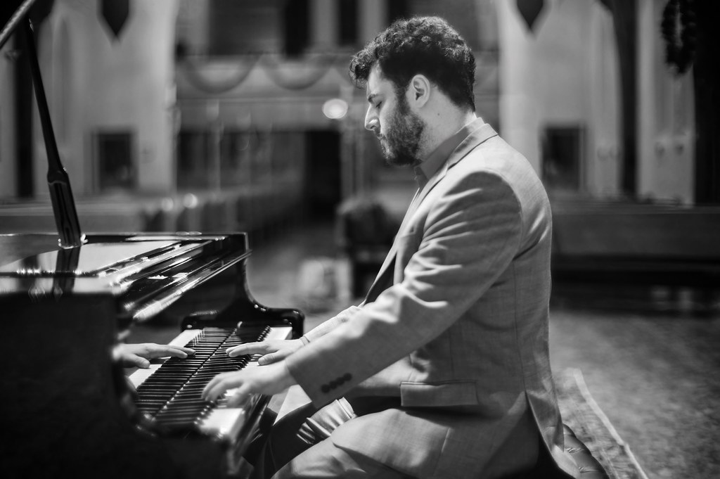 Pianist's Tunes Reverberate in the Church
