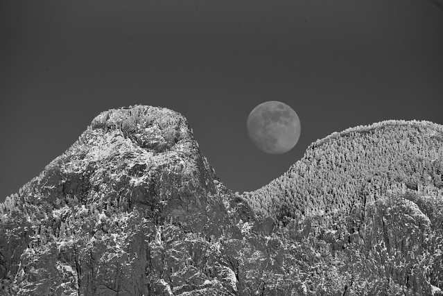 B+W version of moonrise over Sandia Mountain