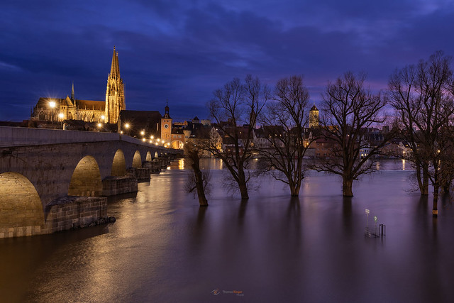 Regensburg at high water at blue hour