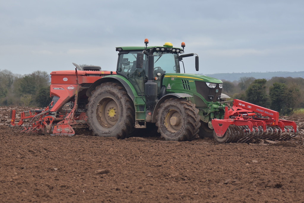 John Deere 6215R Tractor with a HEVA Frontroller 300 Front Press, Kuhn Venta 3030 Seed Drill & HR Power Harrow