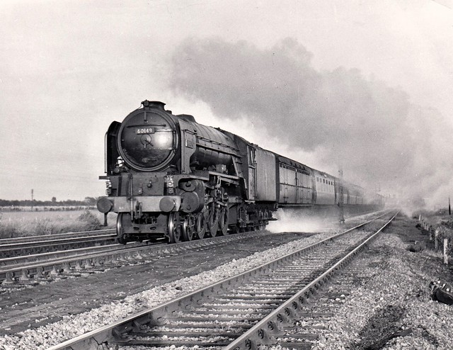 BR Peppercorn Class A1 4-6-2 60149 AMADIS taking water at Werrington troughs, 15th July 1954.