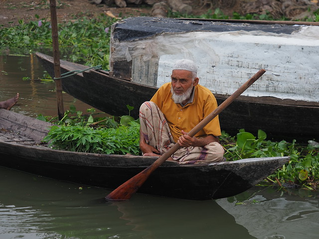 Seedlings vendor on his boat
