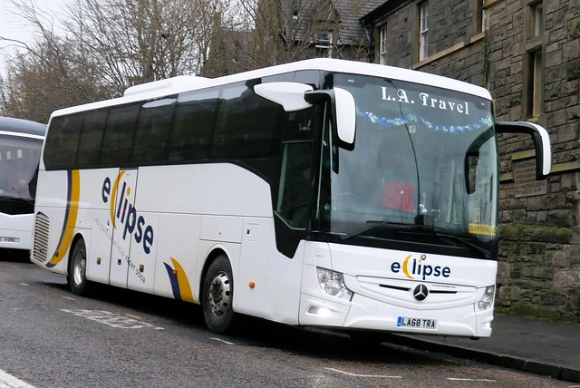 LA Travel of Kirknewton Mercedes Benz Tourismo Base LA68TRA, new in November 2018, in Eclipse Tours livery, at Johnston Terrace, Edinburgh, on 7 December 2023.