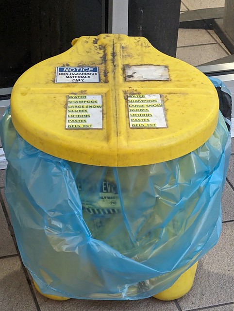 TSA checkpoint confiscata bucket with list of contents, Orlando Airport, Orlando, Florida, USA