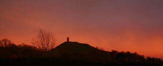 Glastonbury Tor and the tower of St Michael's Church, sunset (panoramic version)