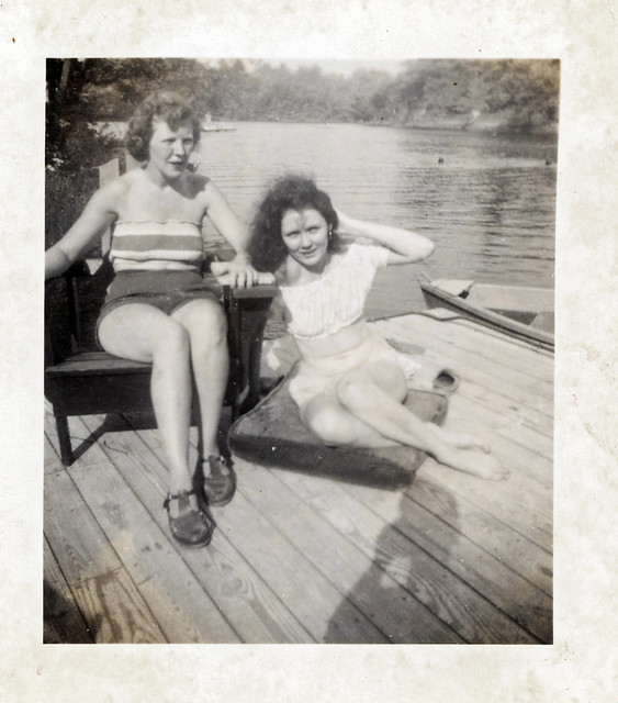 Two Women Sitting on Dock, c. 1950