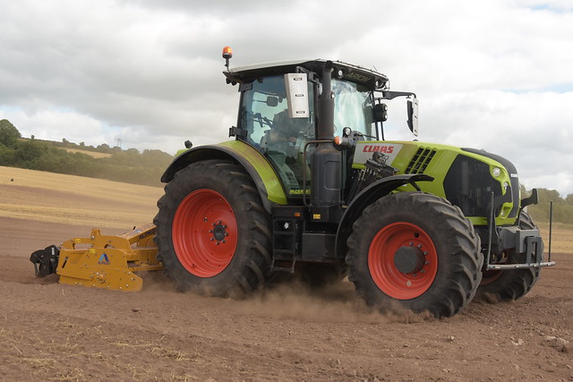 Claas Arion 650 Tractor with an Alpego 3 meter Power Harrow