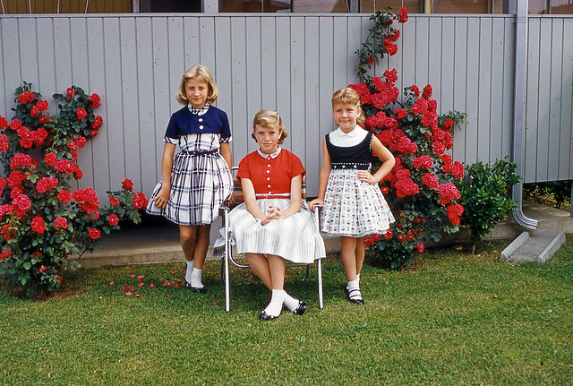 Slide of Three Girls Posing in Back Yard, 1950s