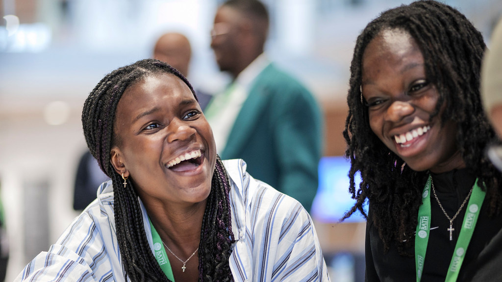 Two female Target Bath students laughing