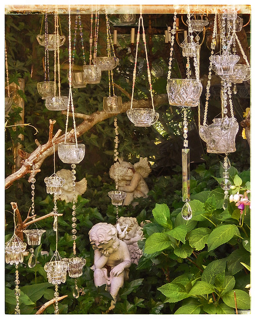 hanging crystal holders at a garden at Art in the Garden in North Vancouver