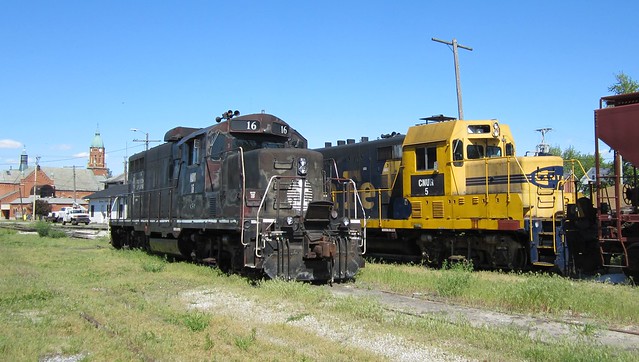 Waiting for the next assignment on the Maumee & Western MAW No.16 and CNUR No. 5 hold down the Yard Tracks in Defiance Ohio