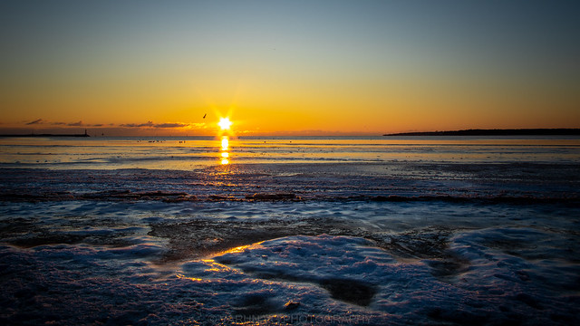 Sunset over frozen sea [Explored]