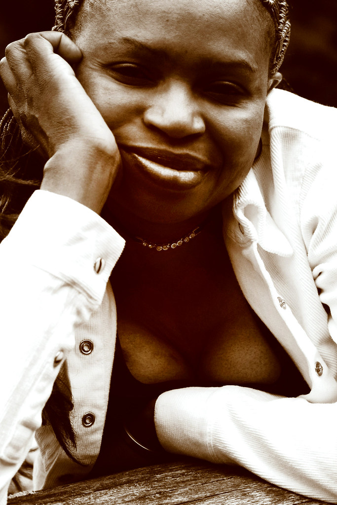 DSCF0231 Sepia Judith Beautiful Zimbabwean Nurse in White Jacket and Black Top with Décolleté Low Neckline Lovely Cleavage on Hampstead Heath London