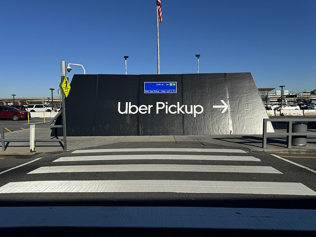 Adhesive Vinyl Graphics on Textured Concrete for Uber at IAD
