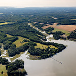 Werowocomoco in Gloucester County, Virginia The historic site of Werowocomoco, now owned by the National Park Service, is seen between Leigh Creek and Bland Creek facing the York River in Gloucester County, Va., on June 15, 2023. Human use of the area known as Werowocomoco dates back 6,000 to 8,000 years and in the early 1600s it was home to Powhatan and his daughter Pocahontas during her childhood. (Photo by Will Parson/Chesapeake Bay Program with aerial support by Southwings)

USAGE REQUEST INFORMATION
The Chesapeake Bay Program&#039;s photographic archive is available for media and non-commercial use at no charge. To request permission, send an email briefly describing the proposed use to requests@chesapeakebay.net. Please do not attach jpegs. Instead, reference the corresponding Flickr URL of the image.

A photo credit mentioning the Chesapeake Bay Program is mandatory. The photograph may not be manipulated in any way or used in any way that suggests approval or endorsement of the Chesapeake Bay Program. Requestors should also respect the publicity rights of individuals photographed, and seek their consent if necessary.