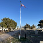 Tioga Cemetery with flag and marker 