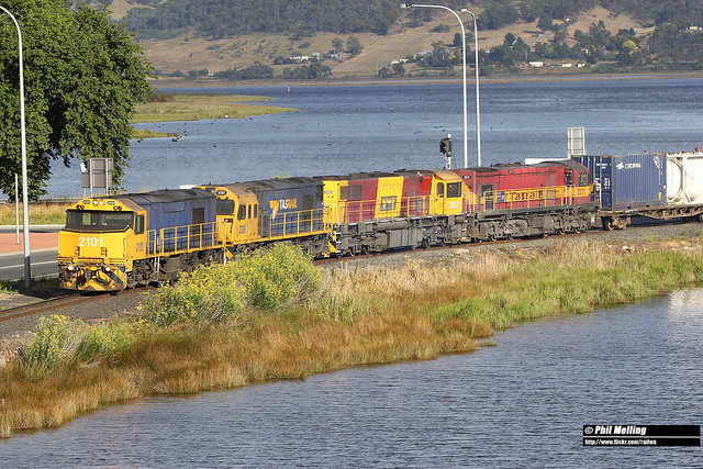 12 January 2014 2101 2131 2052 2011 on 635 freight southbound to Hobart crossing the bridge causeway at Bridgewater.