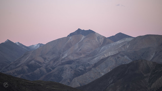 Coloured hillsides with an alpenglow sunset from Sibuk