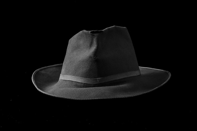 A well-worn & aged felt hat that started as a dress hat and evolved into a garden hat.  Nikon D7100, 18-140mm, 42mm, ISO 200, F22, 8.0.