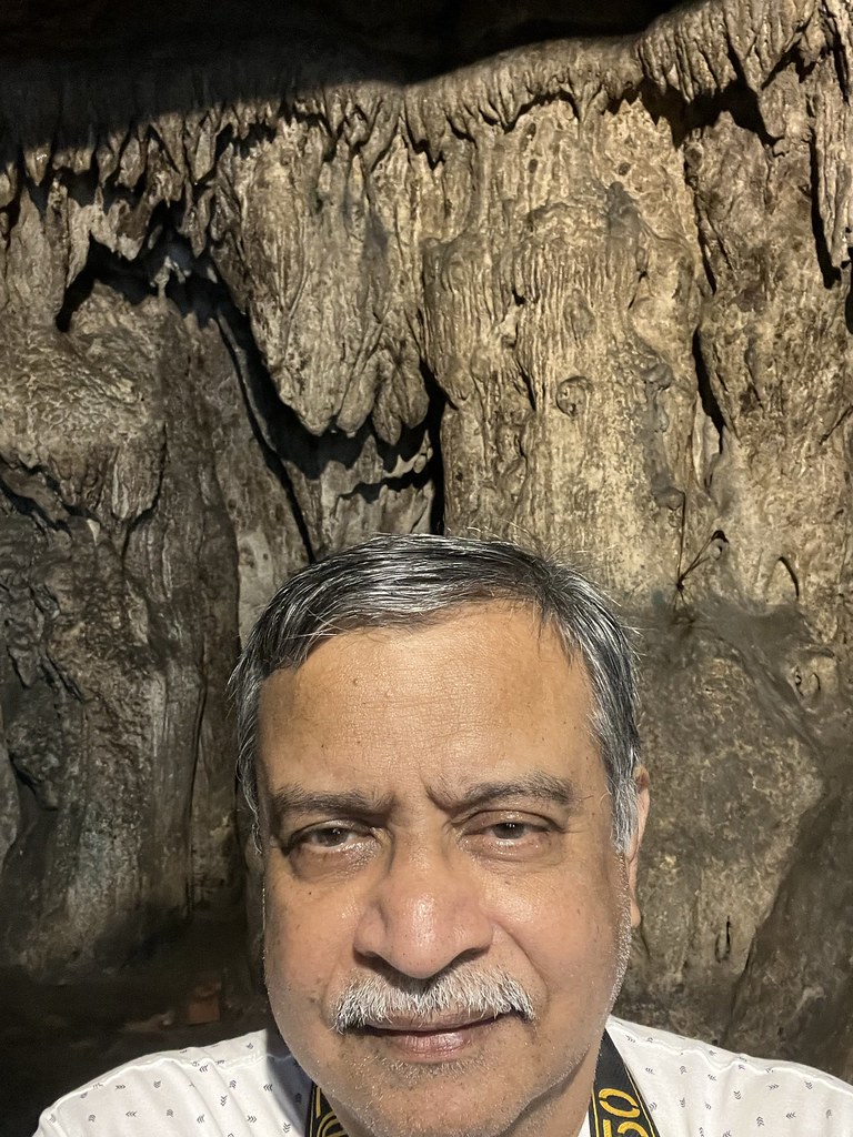 A selfie by the stalactites and stalagmites in the Gua Perak/ Perak Tong cave temple