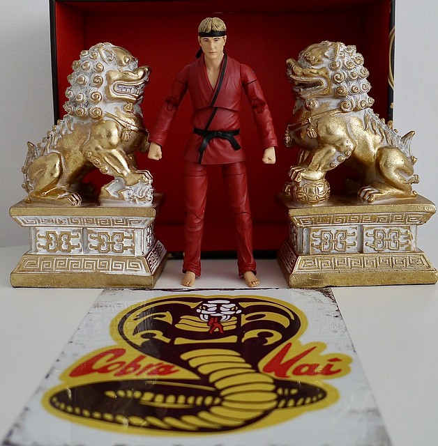 Johnny Lawrence, in a dream, emerges from a new dojo to stamp out Cobra Kai….