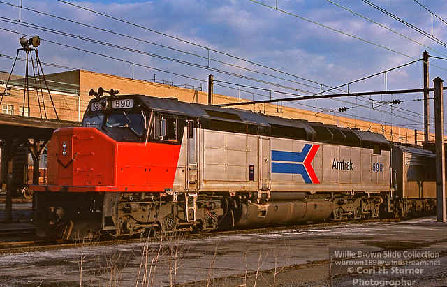 Amtrak SDP40F 590 {built 5/74} is at Harrisburg, PA on Westbound National Limited 2/13/76.