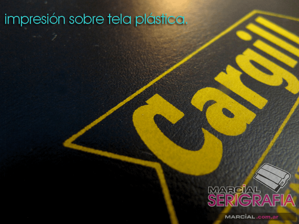 Enlarged image of plastic fabric printing in a folder with logo printed in 1 yellow color. Cargill Balanced foods.