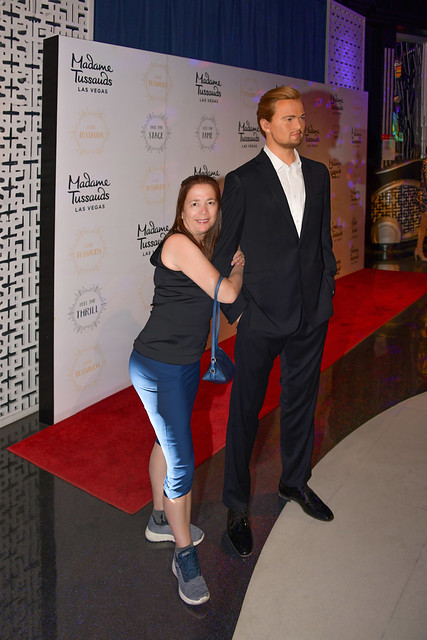 Nevada USA September 30, 2018 A tourist poses holding the arm of the wax figure of the author Leonardo DiCaprio located at Madame Tussauds Las Vegas