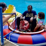 July 26, 2022: Bumper boats at Cook Forest Fun Park, Farmington Township, Clarion County, Pennsylvania An employee at Cook Forest Fun Park in Farmington Township, Clarion County, Pennsylvania helps a park visitor and his daughter into a bumper boat.